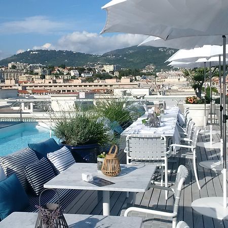 Boscolo Nice Hotel & Spa Kültér fotó The rooftop pool at the Hotel 57